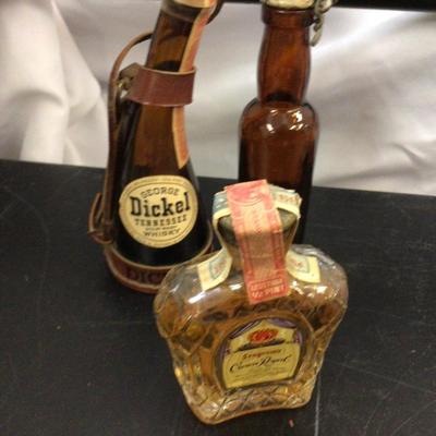 Glass Perfume, crown Royal,and Whiskey.