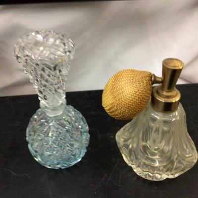Glass Perfume, crown Royal,and Whiskey.
