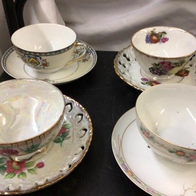 Canister with Matching S&P and Cups and Saucers.