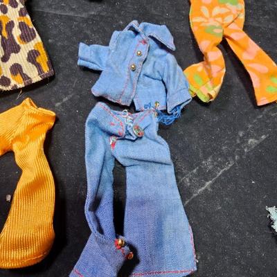 Small 1970 dolls - Barbie like with small outfits
