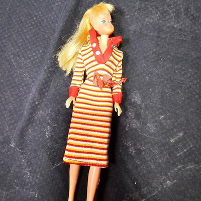 Two barbie dolls and a Ken doll - 1968 Mattel - 1 made Hong Kong - with clothing