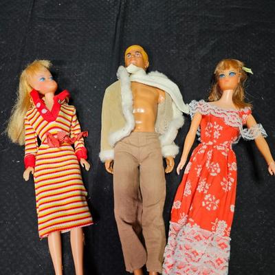 Two barbie dolls and a Ken doll - 1968 Mattel - 1 made Hong Kong - with clothing