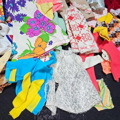 Huge lot of vintage Barbie clothes and a modeling stand for clothing Mattel