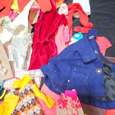 Huge lot of vintage Barbie clothes and a modeling stand for clothing Mattel