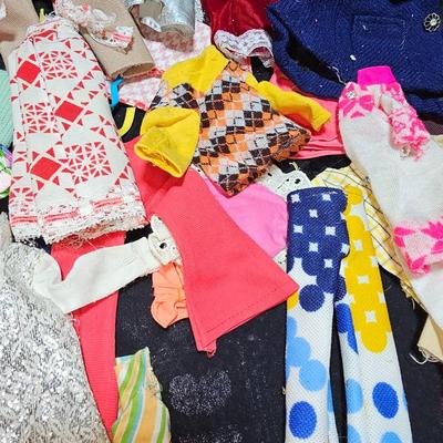 Huge lot of vintage Barbie clothes and a modeling stand for clothing Mattel