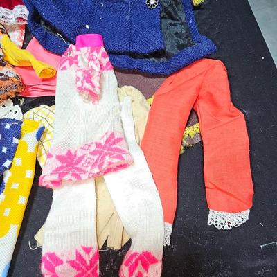 Huge lot of vintage Barbie clothes and a modeling stand for clothing Mattel