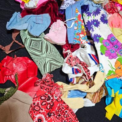 Huge lot of vintage Barbie clothes and a modeling stand for clothing Mattel