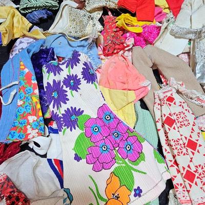 Huge lot of vintage Barbie clothes and a modeling stand for clothing Mattel