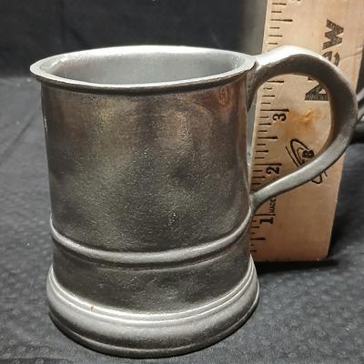 Four Pewter Collectible Beer Steins - One with a bell in the bottom.