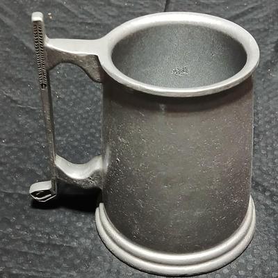 Four Pewter Collectible Beer Steins - One with a bell in the bottom.