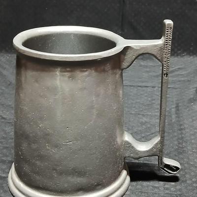 Four Pewter Collectible Beer Steins - One with a bell in the bottom.