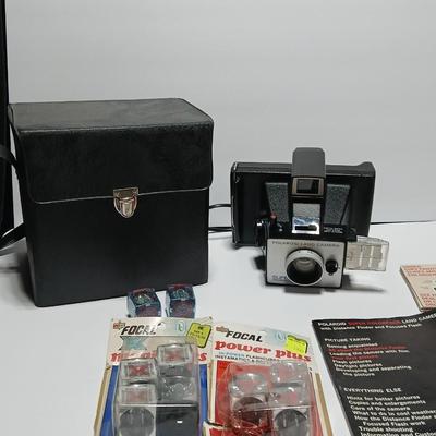 Vintage Polaroid Land Camera Super Color Pack 1973 with some accessories and case