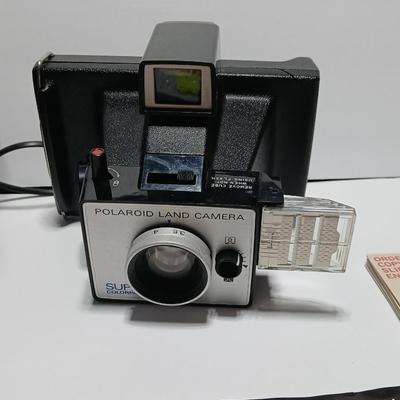 Vintage Polaroid Land Camera Super Color Pack 1973 with some accessories and case