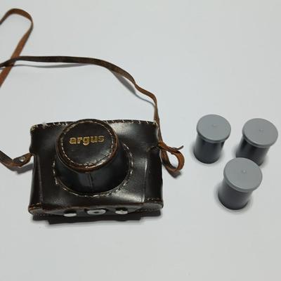 Vintage Argus C-Twenty 35mm camera with case and some film and flash extension