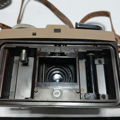 Vintage Argus C-Twenty 35mm camera with case and some film and flash extension