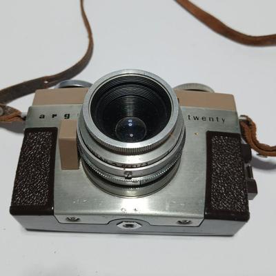 Vintage Argus C-Twenty 35mm camera with case and some film and flash extension