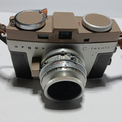 Vintage Argus C-Twenty 35mm camera with case and some film and flash extension