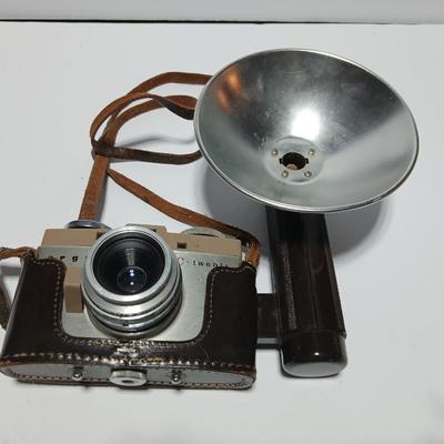 Vintage Argus C-Twenty 35mm camera with case and some film and flash extension