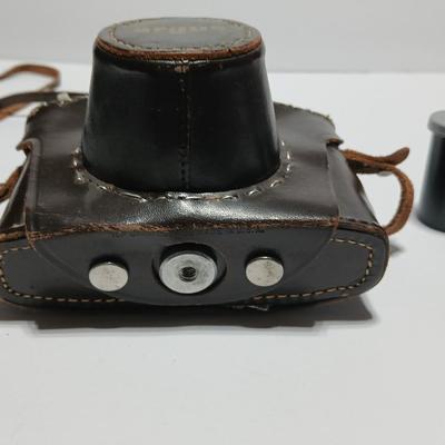 Vintage Argus C-Twenty 35mm camera with case and some film and flash extension