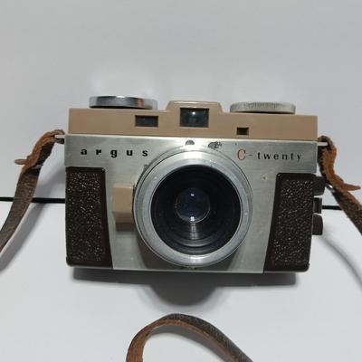 Vintage Argus C-Twenty 35mm camera with case and some film and flash extension