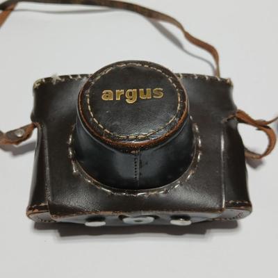 Vintage Argus C-Twenty 35mm camera with case and some film and flash extension