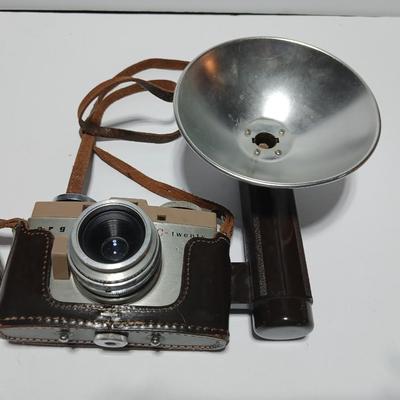 Vintage Argus C-Twenty 35mm camera with case and some film and flash extension
