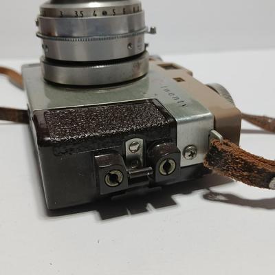 Vintage Argus C-Twenty 35mm camera with case and some film and flash extension