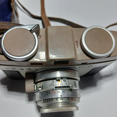 Vintage Argus C-Twenty 35mm camera with case and some film and flash extension