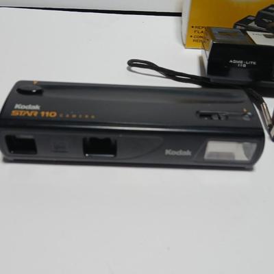 Two Kodak 110 cameras with pocket flash - Star 110 Camera and a Kodak Tele-style lite dual lens pocket camera