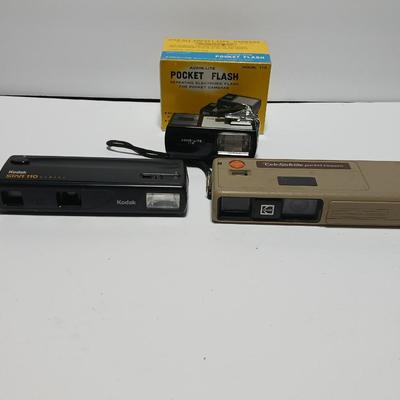 Two Kodak 110 cameras with pocket flash - Star 110 Camera and a Kodak Tele-style lite dual lens pocket camera