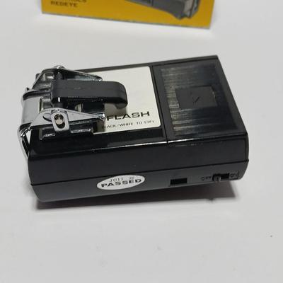 Two Kodak 110 cameras with pocket flash - Star 110 Camera and a Kodak Tele-style lite dual lens pocket camera