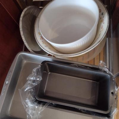Contents of Cabinet- Bakeware, Assorted Kitchen Items, Storage Tins, Jars, etc.