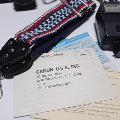 Classic Canon AE-1 with 50mm F1.8 Lens with many accessories and original manuals and more !