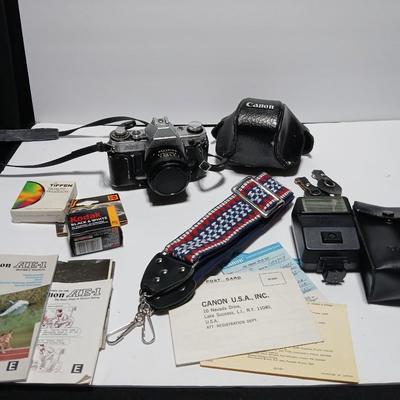 Classic Canon AE-1 with 50mm F1.8 Lens with many accessories and original manuals and more !