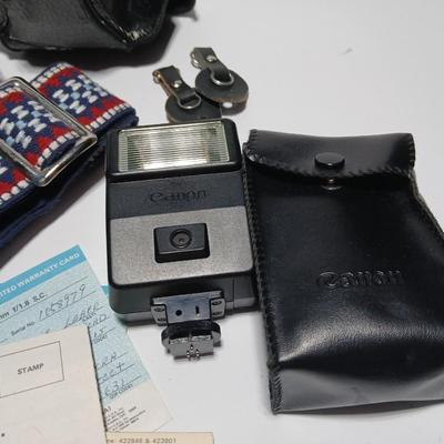 Classic Canon AE-1 with 50mm F1.8 Lens with many accessories and original manuals and more !