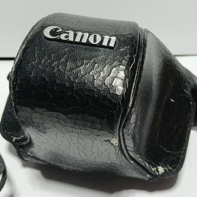 Classic Canon AE-1 with 50mm F1.8 Lens with many accessories and original manuals and more !