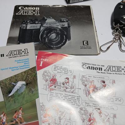 Classic Canon AE-1 with 50mm F1.8 Lens with many accessories and original manuals and more !