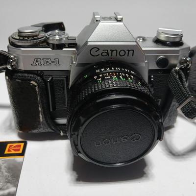 Classic Canon AE-1 with 50mm F1.8 Lens with many accessories and original manuals and more !