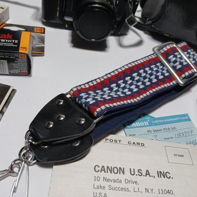 Classic Canon AE-1 with 50mm F1.8 Lens with many accessories and original manuals and more !