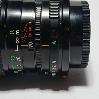 Canon FD Zoom lens 70-150mm with case and booklets and a vintage Cronus 3-S Digital Stopwatch also with case