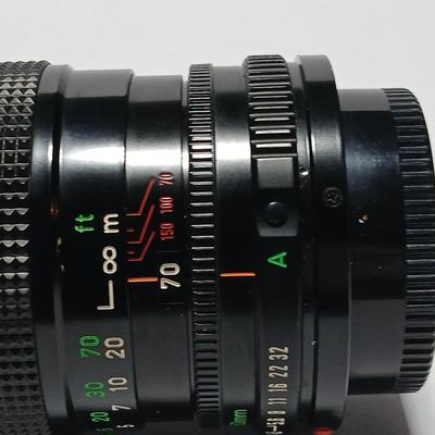 Canon FD Zoom lens 70-150mm with case and booklets and a vintage Cronus 3-S Digital Stopwatch also with case