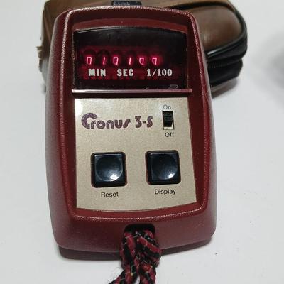 Canon FD Zoom lens 70-150mm with case and booklets and a vintage Cronus 3-S Digital Stopwatch also with case
