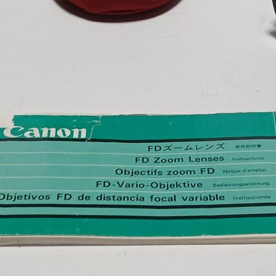 Canon FD Zoom lens 70-150mm with case and booklets and a vintage Cronus 3-S Digital Stopwatch also with case