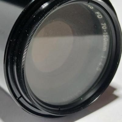 Canon FD Zoom lens 70-150mm with case and booklets and a vintage Cronus 3-S Digital Stopwatch also with case