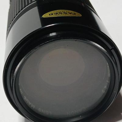 Canon FD Zoom lens 70-150mm with case and booklets and a vintage Cronus 3-S Digital Stopwatch also with case