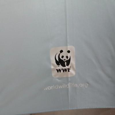 Rubbermaid 56 cooler with Panda bear umbrella and vintage metal Coleman water dispenser
