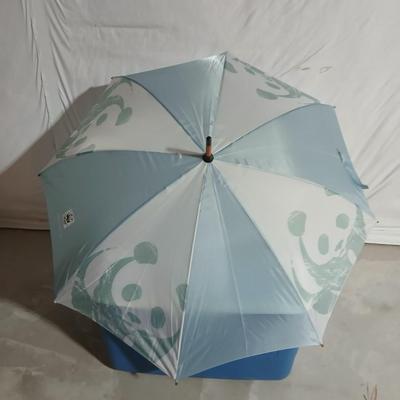 Rubbermaid 56 cooler with Panda bear umbrella and vintage metal Coleman water dispenser