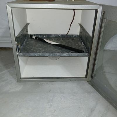 Chemical thermometer TH-2 with machine that has a galvanized metal tray inside