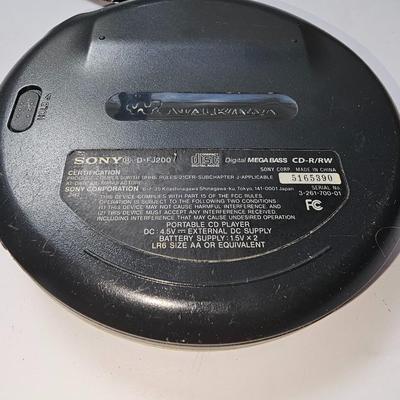Assortment of music on CD in wood box with Sony Portable cd player