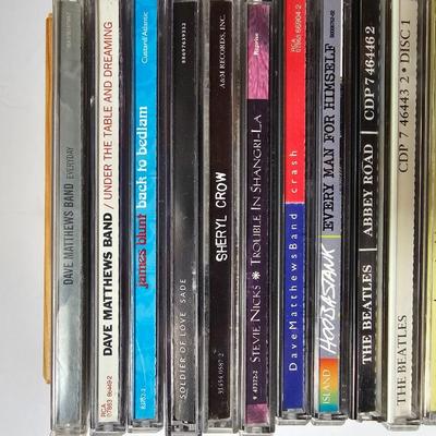 Assortment of music on CD in wood box with Sony Portable cd player